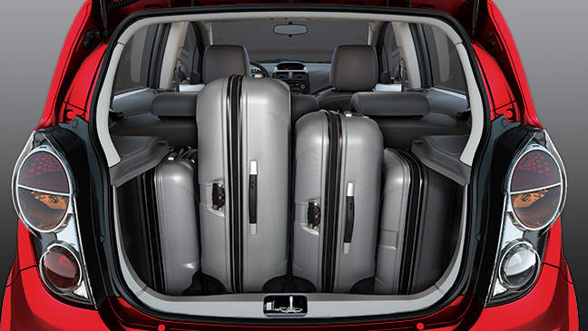 CHEVROLET-SPARK-2014-648x365_RED-suitcase-Spacious-cargo-room.jpg