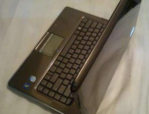 neatly-used-hp-dv5-laptop_3666a5f3_3.jpg