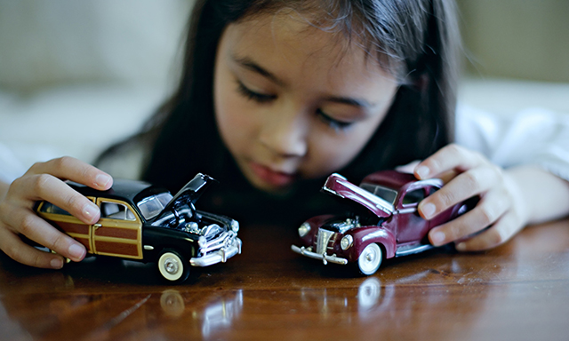 Girl-plays-with-toy-cars-014.jpg