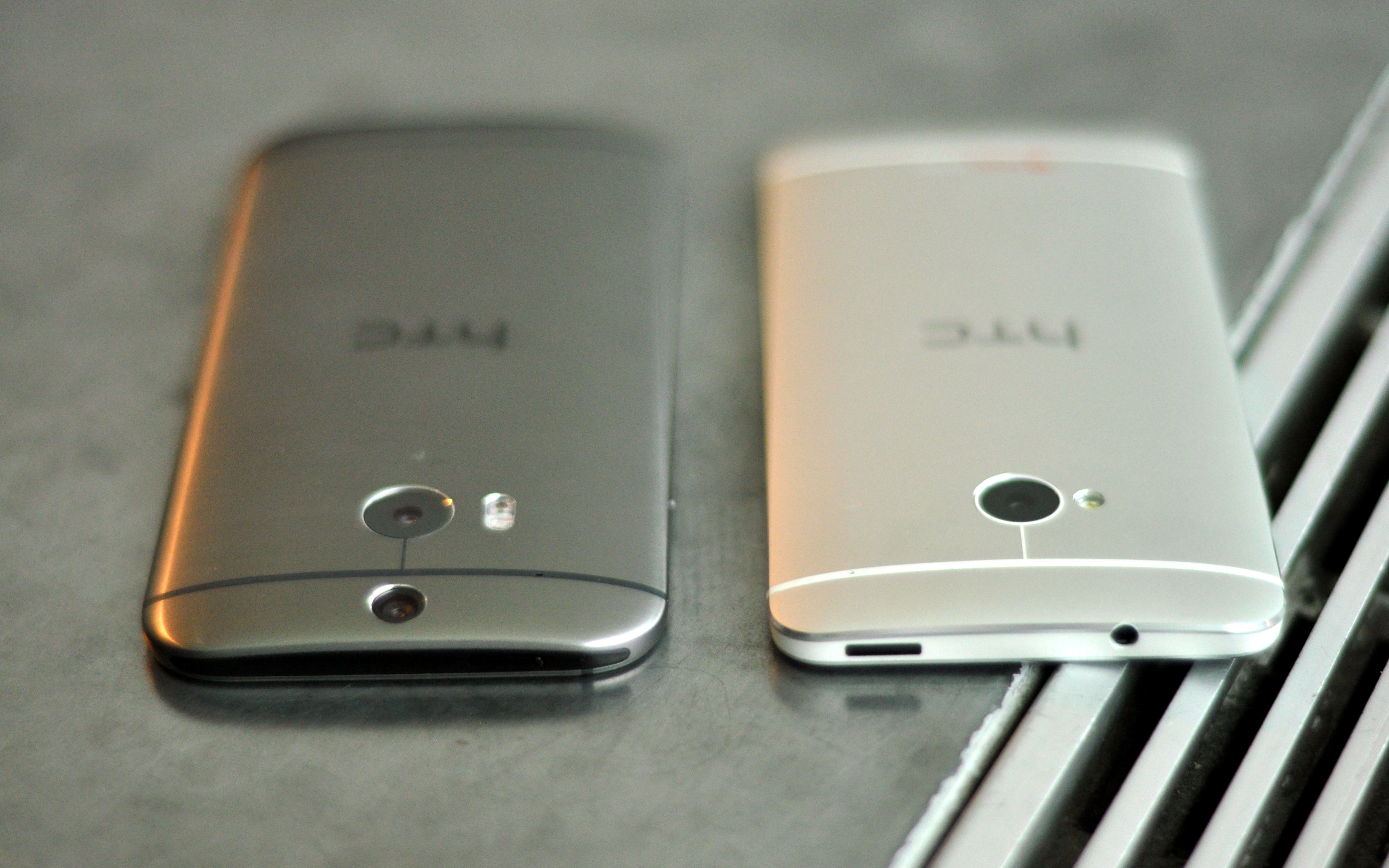 HTC-One-M7-vs-HTC-One-M8-specs-price-design-compared-thickness.jpg