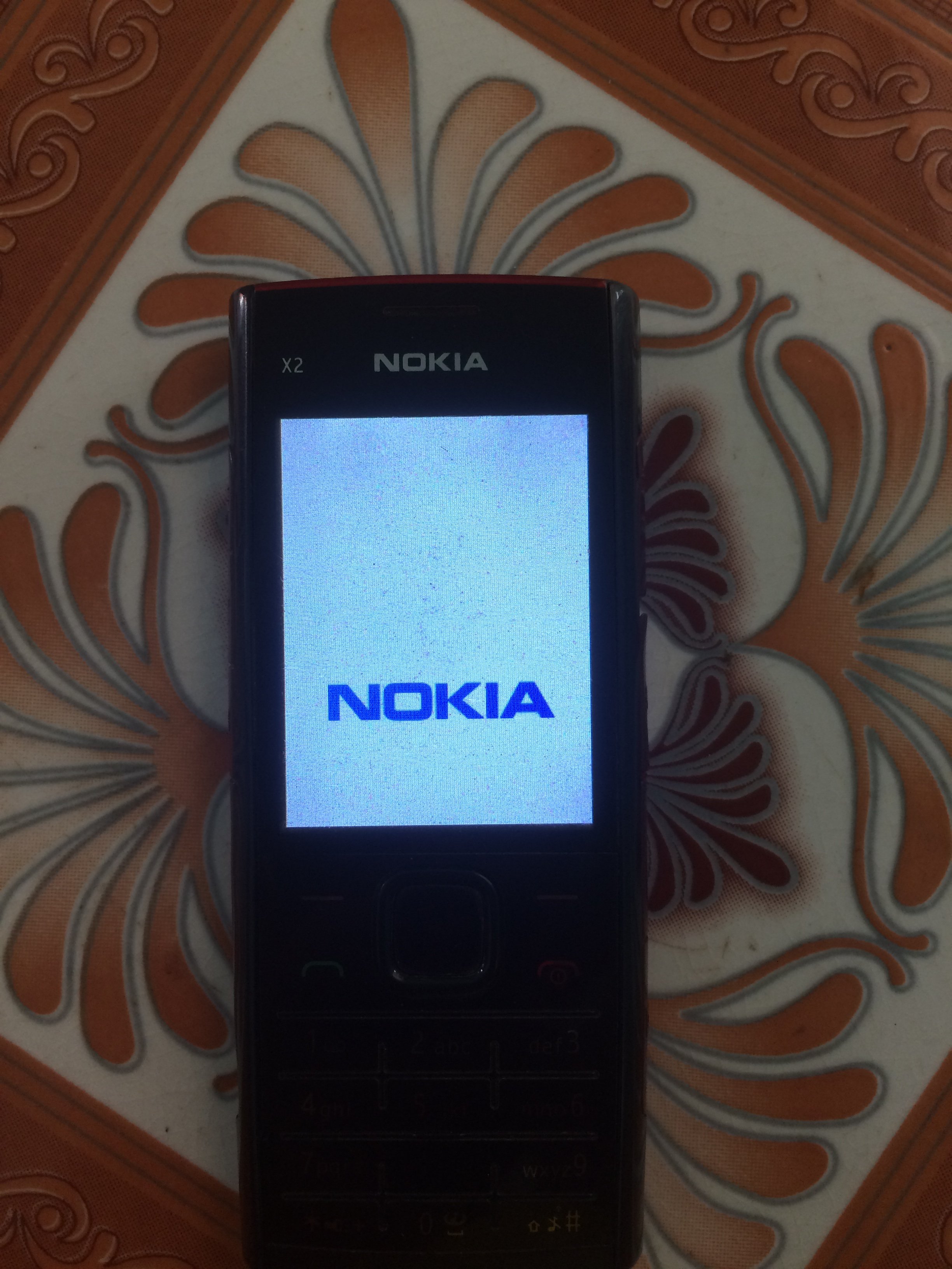 Nokia X2-00 bị treo logo